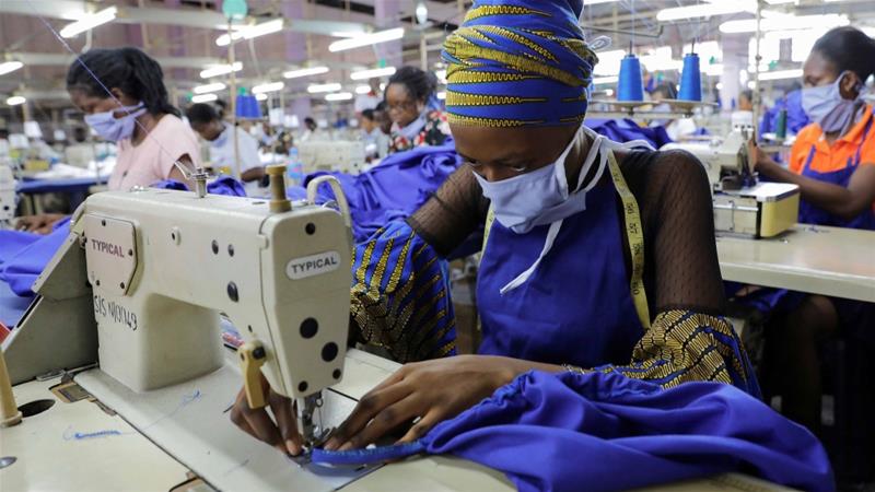 Factory workers begin the production of personal protective gear for local frontline health workers commissioned by the Ghanian government in Accra on April 10 2020