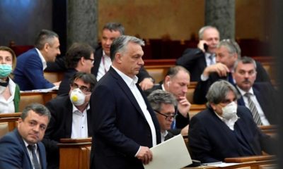 Hungarian Prime Minister Viktor Orban arrives in parliament ahead of a vote on a special law to combat the coronavirus crisis in Budapest Hungary on March 30 2020