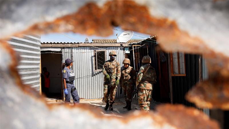 Soldiers and police patrol in Khayelitsha South Africa as authorities attempt to enforce a 21 day nationwide lockdown aimed at limiting the spread of the new coronavirus