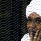 Sudans former president Omar Hassan al Bashir sits inside a cage at the courthouse where he is facing corruption charges in Khartoum on September 28 2019