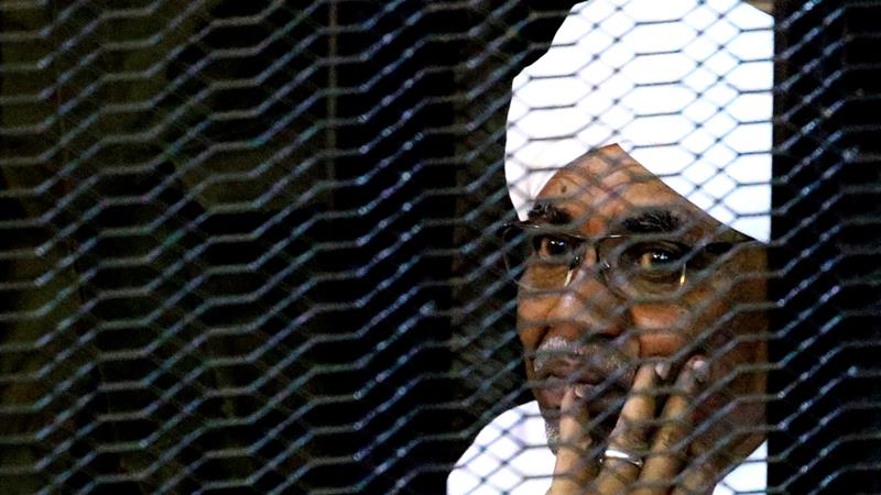 Sudans former president Omar Hassan al Bashir sits inside a cage at the courthouse where he is facing corruption charges in Khartoum on September 28 2019