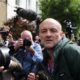 Journalists question Dominic Cummings special adviser to UK Prime Minister Boris Johnson as he leaves his house in London on May 24 2020