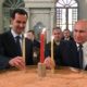 Russian President Vladimir Putin and his Syrian counterpart Bashar al Assad visit an Orthodox Christian church in Damascus Syria on January 7 2020