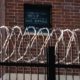 Signs made by prisoners pleading for help are seen on a window of Cook County Jail in Chicago Illinois US April 7 2020 amid the COVID 19 outbreak