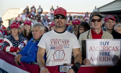 A member of the audience wears a shirt that reads Proud to Be A Trump Deplorable as President Trump speaks at a rally in Murphysboro IllinoisUS Oct 27 2018