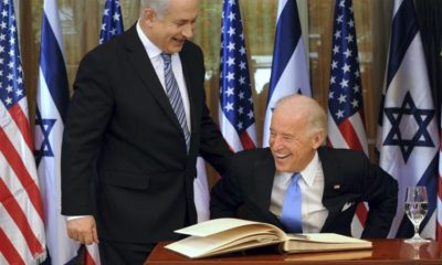 In this 2010 file photo Israels Prime Minister Benjamin Netanyahu is seen laughing with then United States Vice President Joe Biden in Jerusalem