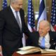 In this 2010 file photo Israels Prime Minister Benjamin Netanyahu is seen laughing with then United States Vice President Joe Biden in Jerusalem