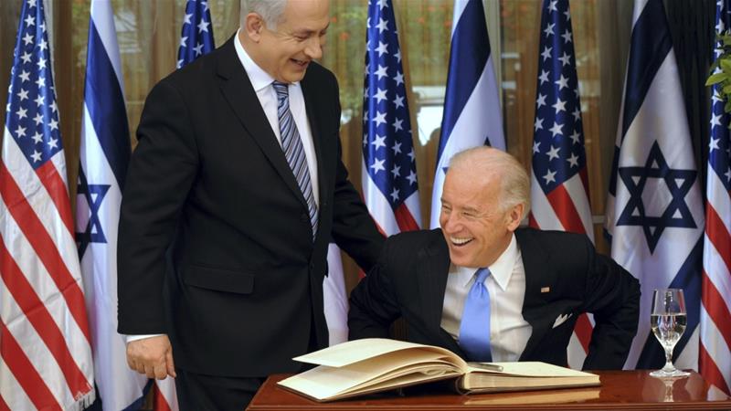 In this 2010 file photo Israels Prime Minister Benjamin Netanyahu is seen laughing with then United States Vice President Joe Biden in Jerusalem