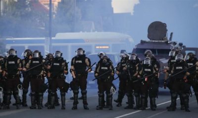 Police in riot gear prepare to advance on protesters rallying after the death of George Floyd in Minneapolis US on May 30 2020