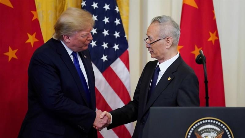 US President Donald Trump shakes hands with Chinese Vice Premier Liu He after signing phase one of the US China trade agreement in Washington US on January 15 2020