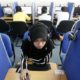 A woman browses the Internet at a cyber cafe in Putrajaya Malaysia on June 16 2011