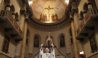Don Angelo Riva who lost his father to the coronavirus outbreak leads a mass in an empty church in Carenno Italy on April 2 2020