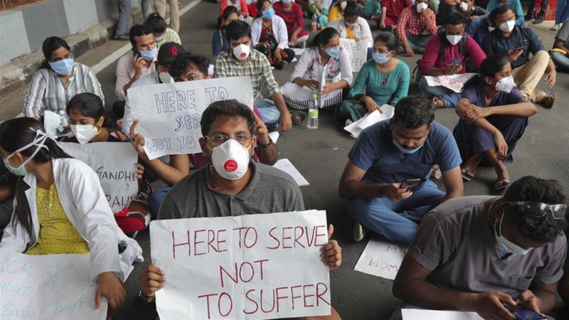 Junior doctors from Government Gandhi Hospital protest outside the hospital demanding action against the attack on a colleague in Hyderabad India on June 10 2020
