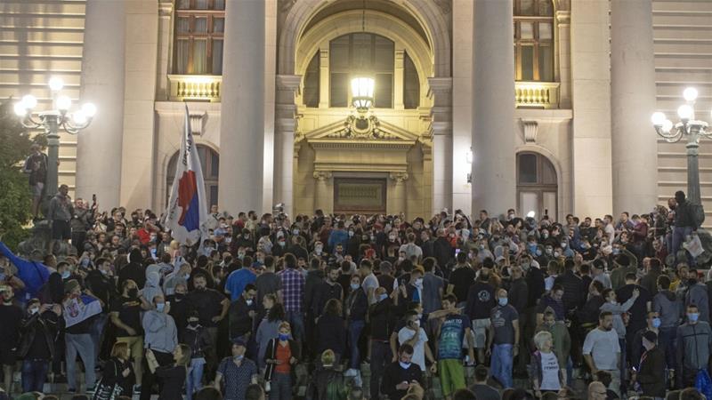 Protesters gather in front of the Serbian parliament after the president announced the imposition of a curfew due to the COVID 19 outbreak in Belgrade on July 7 2020
