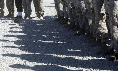 US Marines stand guard during a change of command ceremony in the Shorab military camp Helmand province Afghanistan Jan 15 2018