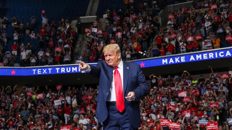 US President Donald Trump points at the crowd during a re election campaign at the BOK Center in Tulsa Oklahoma US on June 20 2020 1