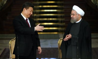 Chinas President Xi Jinping left and his Iranian counterpart Hassan Rouhani are seen together following a joint press conference in Tehran Iran January 23 2016