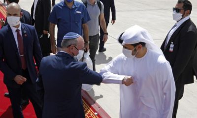 Israeli National Security Adviser Meir Ben Shabbat elbow bumps with an Emirati official as he leaves Abu Dhabi on September 1 2020