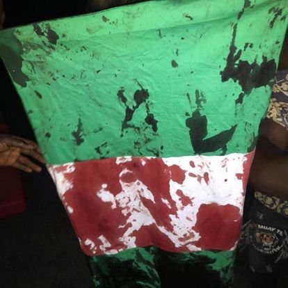 Nigeria flag stained in blood End SARS