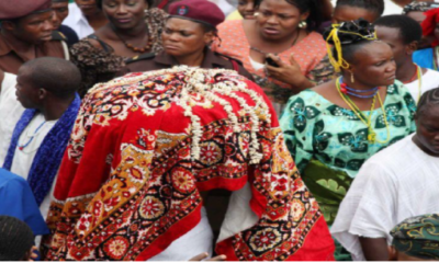 Worshipers of the Osun goddess make their way along with an unidentified virgin girl 'Arugba', center, to the river in Osogbo, Nigeria.