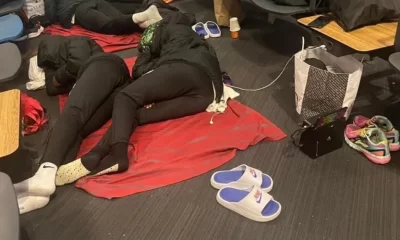 Falconets sleeping on chairs and floor at Istanbul Credit - Collin Udoh