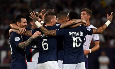 Neymar is congratulated by teammates