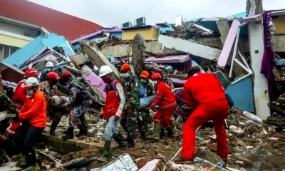 Indonesia-earthquake - Rescuers making efforts to save persons trapped in the damaged buildings