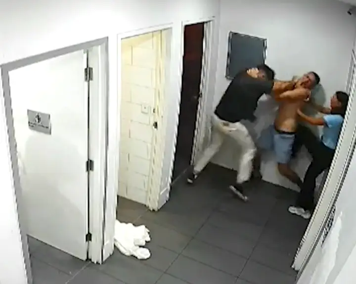 Man fights cleaner in bathroom
