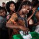 Vote and democracy in Nigeria - 2022-06-29-woman-casts-ballot-nigeria