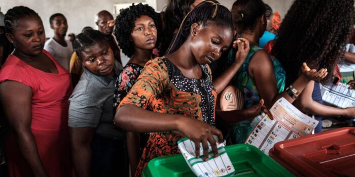 Vote and democracy in Nigeria - 2022-06-29-woman-casts-ballot-nigeria