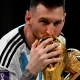 Messi kiss the 2022 world cup won by Argentina