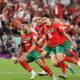 Morocco players celebrating their win against Spain