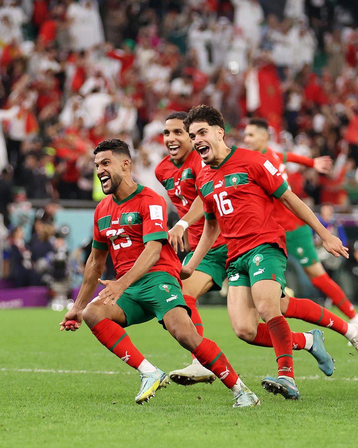 Morocco players celebrating their win against Spain