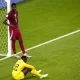 Qatar players react after the final whistle of the Qatar 2022 World Cup Group A football match between Qatar and Senegal at the Al-Thumama Stadium in Doha on November 25, 2022