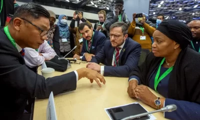 Brazil’s foreign affairs ministry’s lead climate negotiator Leonardo Cleaver de Athayde speaks with Vice Prime Minister and Environment Minister for Democratic Republic of Congo, Eve Bazaiba Masudi