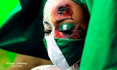 Lady wearing Nigeria flag