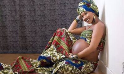 Pregnant African woman and mother