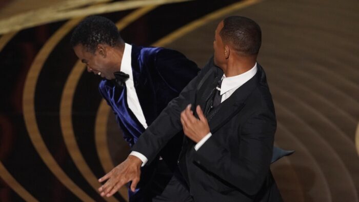 Will Smith strikes Chris Rock across the face for making jokes about his wife Jada Pinkett-Smith