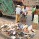 Environmental sanitation in Nigeria - bus, truck and dirt