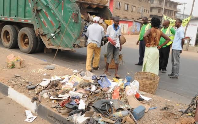 Environmental sanitation in Nigeria - bus, truck and dirt