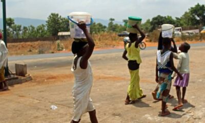 Young children hawking on the street