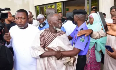 Lamidi Apapa being protected by security operatives