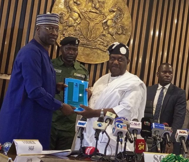 Boss Mustapha handing over to George Akume