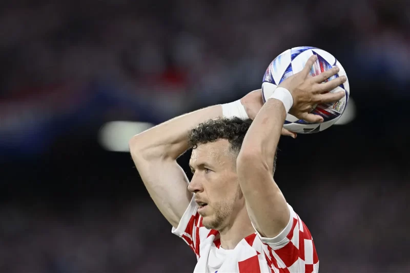 Croatia’s midfielder Ivan Perisic takes a throw in during the UEFA Nations League semi final football match between The Netherlands and Croatia at the De Kuip Stadium in Rotterdam on June 14, 2023. (Photo by JOHN THYS / AFP)