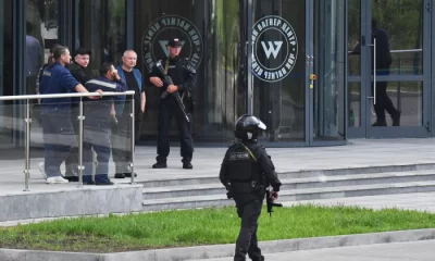 Russian police officers patrol in an area outside PMC Wagner Centre in Saint Petersburg, on June 24, 2023. – Wagner chief ‘betrayed’ Russia out of ‘personal ambition’ announced President Vladimir Putin during a statement to the nation, on June 24, 2023, as Russia faced a rebellion by the Wagner mercenary group that has vowed to topple Moscow’s military leadership. (Photo by Olga MALTSEVA / AFP)