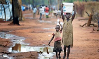 Poverty, child labour, children fetching water, north, village
