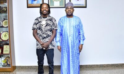 Naira Marley and Director, Buba Marwa