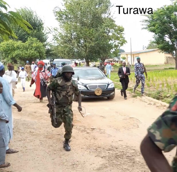 Soldier escorting an emir in the North
