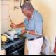 Old man cooking