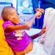 Sanwo-Olu meet boy with missing intestines
